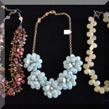 J02. Costume jewelry necklaces. 